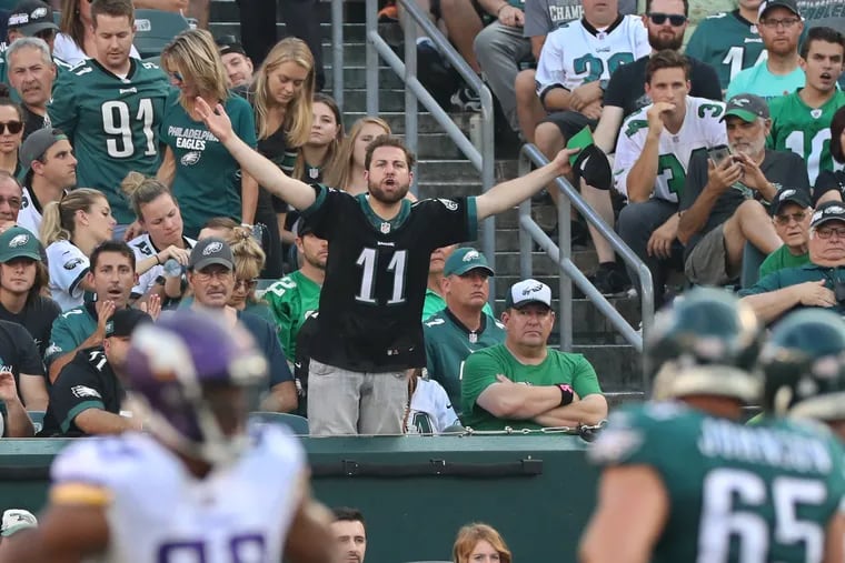 An eagles fan can not contain his frustration with the sputtering offense and penalties the Ealges were suffering through in the second quarter that kept them from getting a first down. The Eagles lost to the Minnesota Vikings on October 7, 2018, 23-21. MICHAEL BRYANT / Staff Photographer