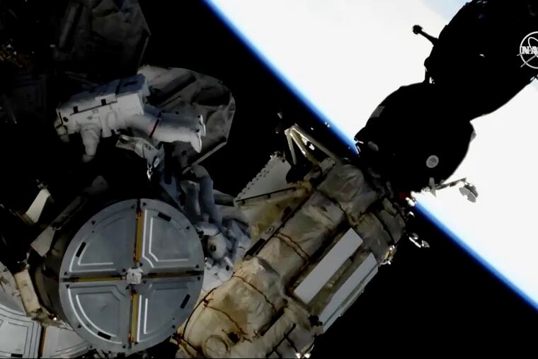 This image provided by NASA shows astronauts Anne McClain and Nick Hague taking a spacewalk to replace aging batteries on the International Space Station on Friday, March 22, 2019. Friday’s spacewalk is the first of three planned excursions to replace batteries and perform other maintenance.