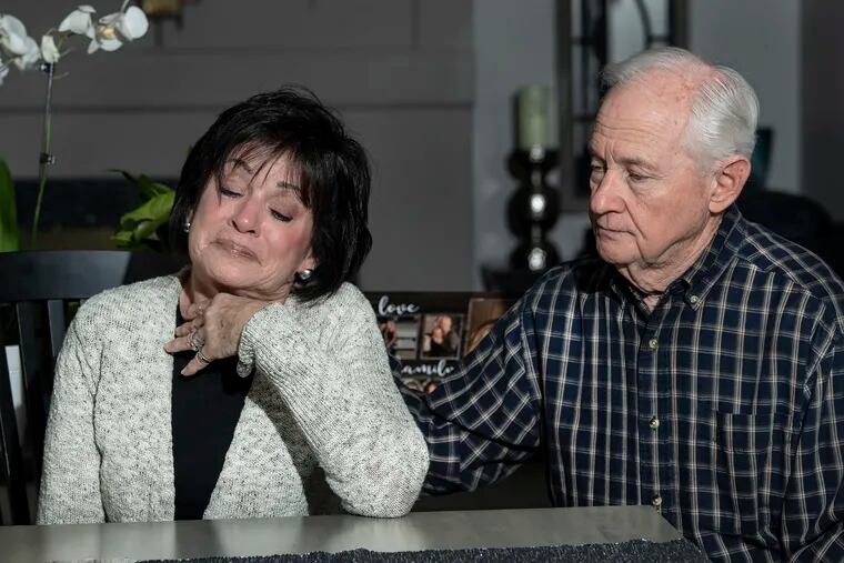 Richard DeRosa comforts his wife, Roseann, days after the DUI-homicide death of their daughter in February. Deana DeRosa's killer had been convicted in court of DUI five prior times.