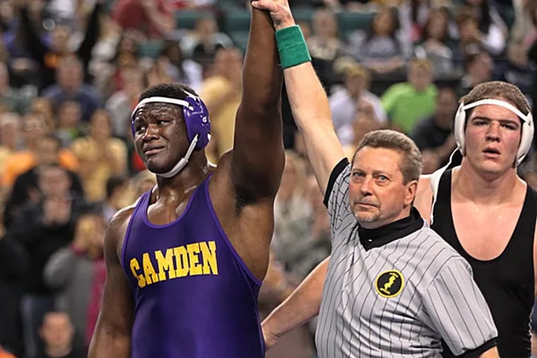 Andrew Stevens, from Camden High School, became the first wrestler to ever win a State Championship wrestling by beating Tyler Gildner, 3-0, at 285 pounds. (Michael Bryant/Staff Photographer)