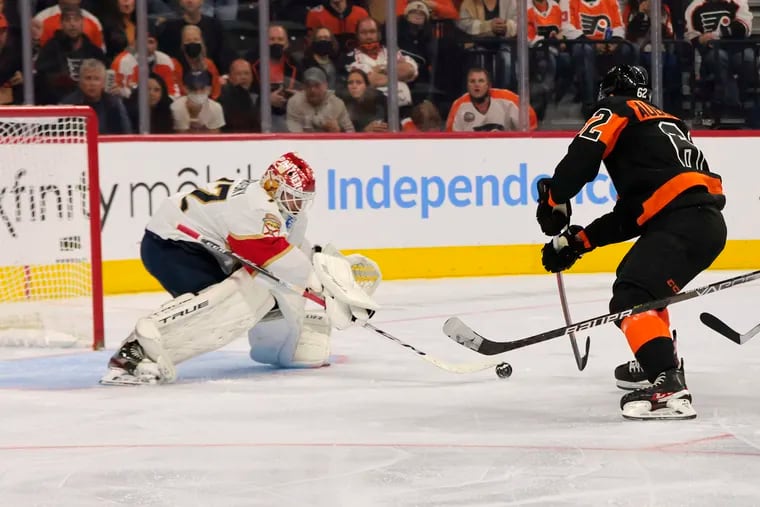 Panthers goalie Sergei Bobrovsky stops the Flyers' Nic Aube-Kubel in the third period of Florida's 4-2 win Saturday at the Wells Fargo Center.