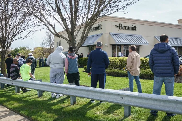 Shoppers waited in line at The Botanist in Williamstown, on the first day of recreational cannabis sales last Thursday.