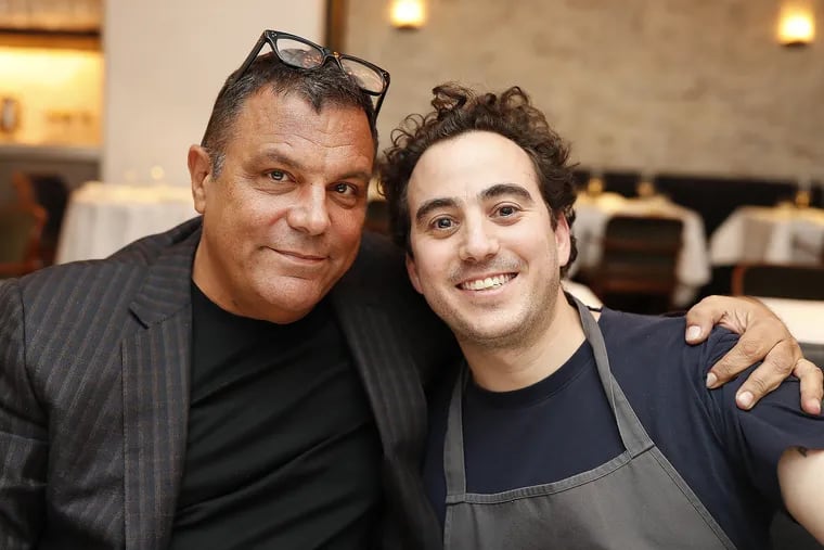 Stephen Starr (left) and chef Daniel Rose in the dining room at Le Coucou in New York.