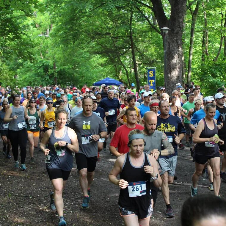 Participants in a previous Wissahickon Trail Classic, a 10k run through Wissahickon Valley Park that's been revived for 2023 after going dormant during the pandemic.