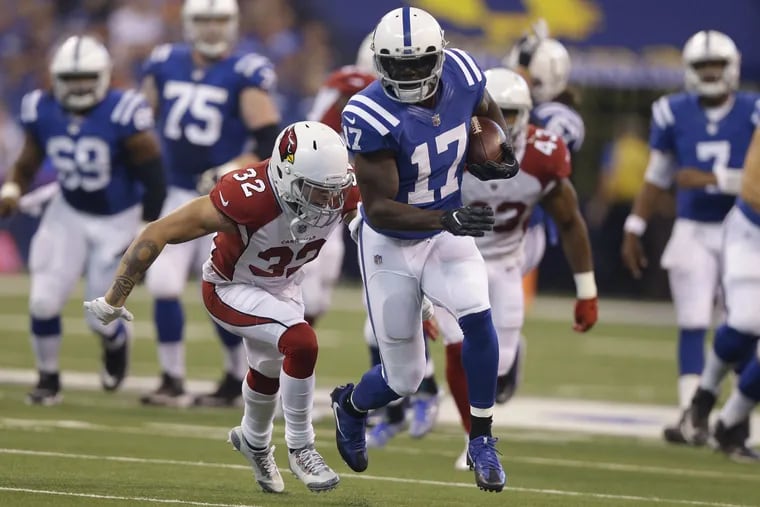 Indianapolis Colts' Kamar Aiken (17) is tackled buy Arizona Cardinals' Tyrann Mathieu during the first half of an NFL football game Sunday, Sept. 17, 2017, in Indianapolis. (AP Photo/Michael Conroy)