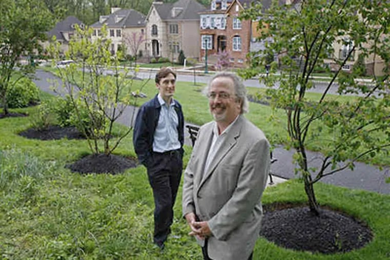 Woodmont, a project of W. Joseph Duckworth (right), president of Arcadia Land Co., and son Jason, vice president, now is on the town's Web site. (Michael S. Wirtz / Staff Photographer)