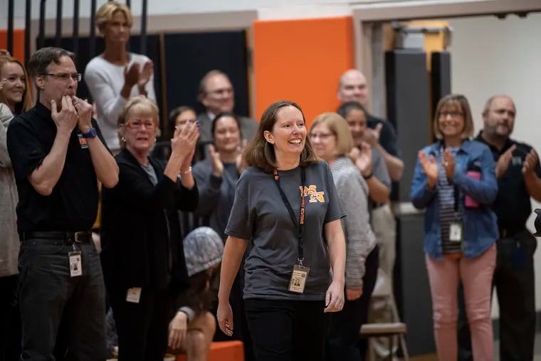 Marple Newtown High School Teacher, Elizabeth Landes smiles after receiving a $25,000 Milken Award, which recognizes excellence in teaching, during a surprise ceremony at school on Thursday, Oct. 3, 2019 in Newtown Square, PA.