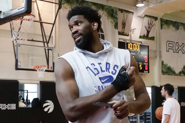 Sixers center Joel Embiid leaves practice at the Scotiabank Arena in Toronto on Friday, April 22, 2022.  The Sixers play the Toronto Raptors in Game 4 of the first-round Eastern Conference playoffs on Saturday afternoon