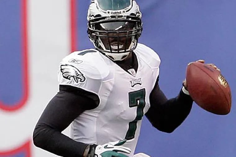 Michael Vick led the Eagles to three touchdowns in a span of 6 minutes, 19 seconds. (Yong Kim/Staff Photographer)
