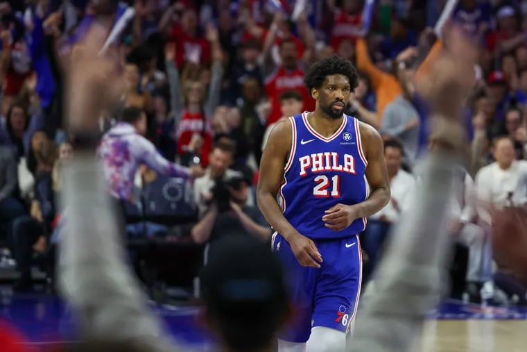 The Wells Fargo Center crowd reacts after the Sixers’ Joel Embiid hits a three-pointer in the third quarter of Game 3 against the Knicks.