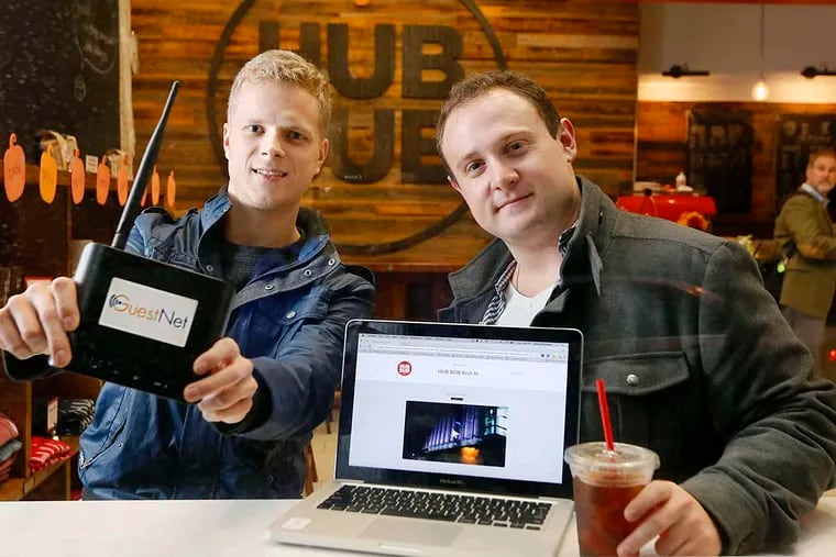 GuestNet founders Alan Jacobson (left) and Jesse Bookspan are marketing their ad service to small businesses losing profit from patrons lingering online without an additional purchase.