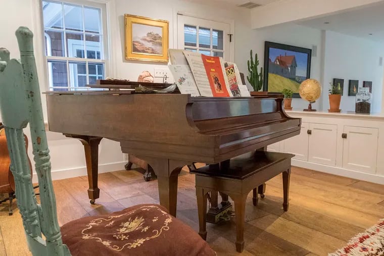 Daphne Howard has played the Steinway piano in the playroom since she was a child.