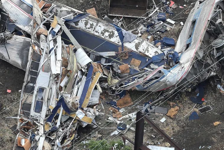 The remains of one of the rail cars from Amtrak train 188 derailment rest at the scene in the Port Richmond section of Philadelphia, on May 14, 2015.