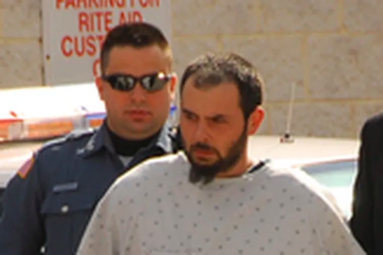 David Galdo, 26, is brought in to face charges in his aunt&#0039;s death.