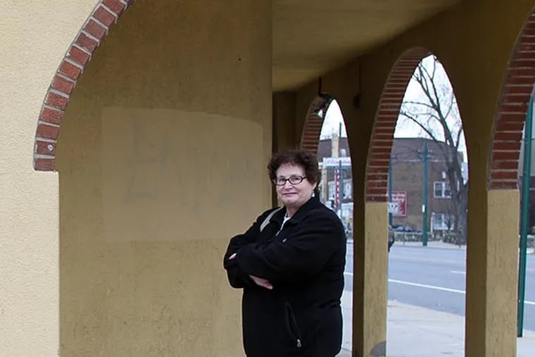 Holmesburg resident Patti Vaughn stands near the methadone clinic she and other residents are trying the prevent from opening on the 7900 block of Frankford Avenue. (Yong Kim / Staff Photographer)