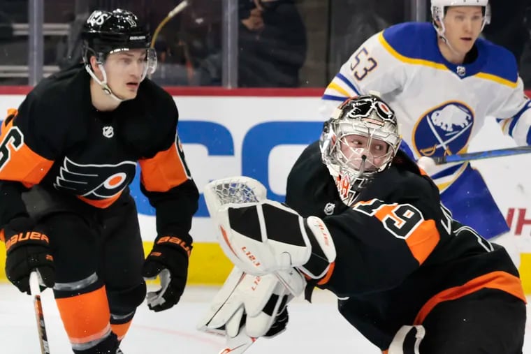 Goalie Carter Hart (right) and the Flyers will be trying to bounce back from a dismal season.
