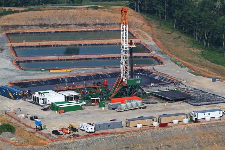 Aerial view of a Marcellus Shale drilling operation near Waynesburg, Pa. late last year. The pools of water are used in the high pressure extraction of natural gas from the shale. ( Michael Bryant / Staff Photographer  )
