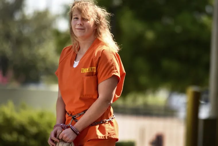 Reality Winner, 26, walks out of the Federal Courthouse in Augusta, Ga., Tuesday, June 26, 2018 after pleading guilty to leaking a classified document allegedly taken while she was working as a NSA contractor at Fort Gordon, Ga. She has been held in custody for nearly 13 months on a charge of violating the federal Espionage Act.