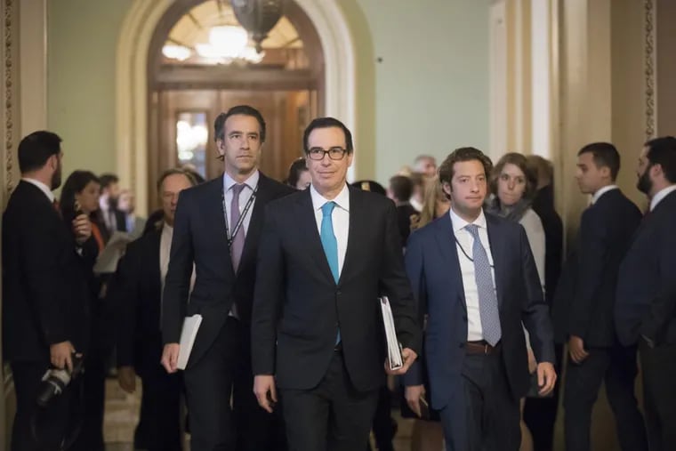 Treasury Secretary Steven Mnuchin (center front) arrives at the Capitol for a meeting with Senate Majority Leader Mitch McConnell on tax reform last month.