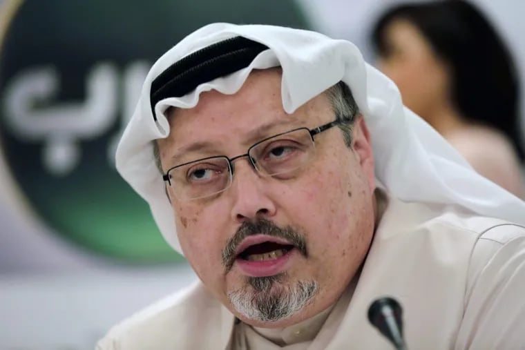 FILE – In this Feb. 1, 2015, file photo, Saudi journalist Jamal Khashoggi speaks during a news conference in Manama, Bahrain.