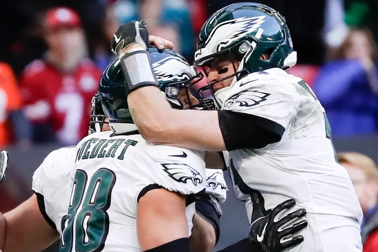 Eagles quarterback Carson Wentz and tight end Dallas Goedert are both represented by Rep1 Football.