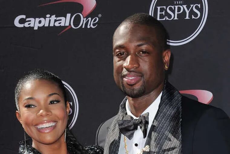 Gabrielle Union and Dwyane Wade, newly engaged, have a baby to deal with - his. JORDAN STRAUSS / Invision / AP