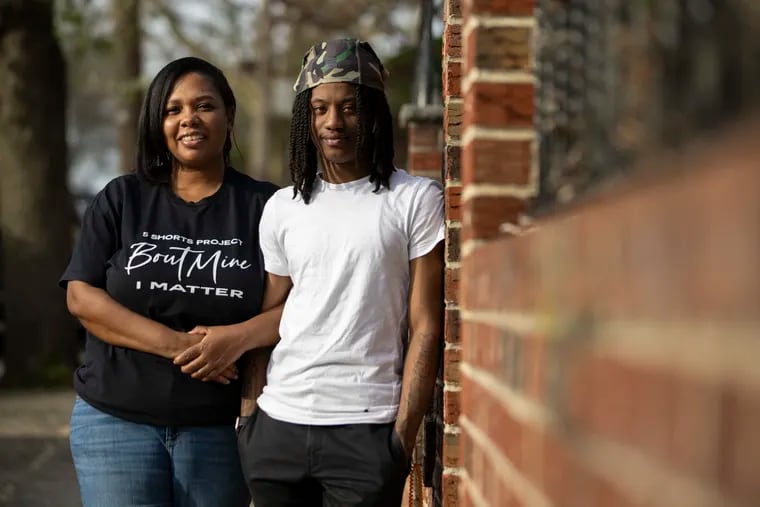 Shameka Sawyer (left) and her nephew, Amir Taylor, 19, pose for a portrait near her home in Philadelphia. Sawyer founded the 5 Shorts Project, an initiative that teaches filmmaking to BIPOC youth. Taylor recently worked on a short film as part of the project.