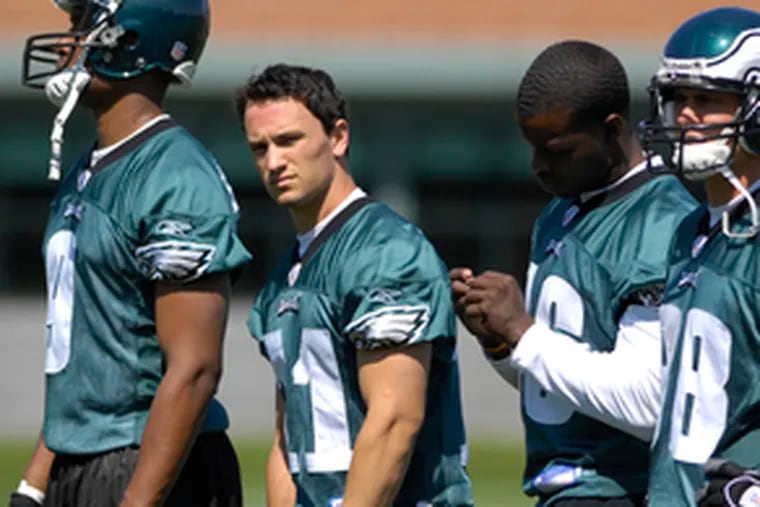 Jeremy Bloom takes a break during Eagles minicamp on Monday.