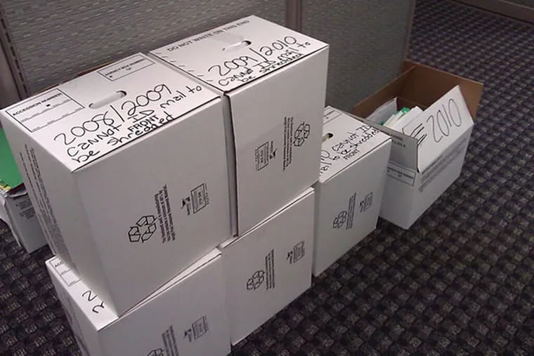 Boxes containing unanswered correspondence from veterans at the Philadelphia Regional Office.