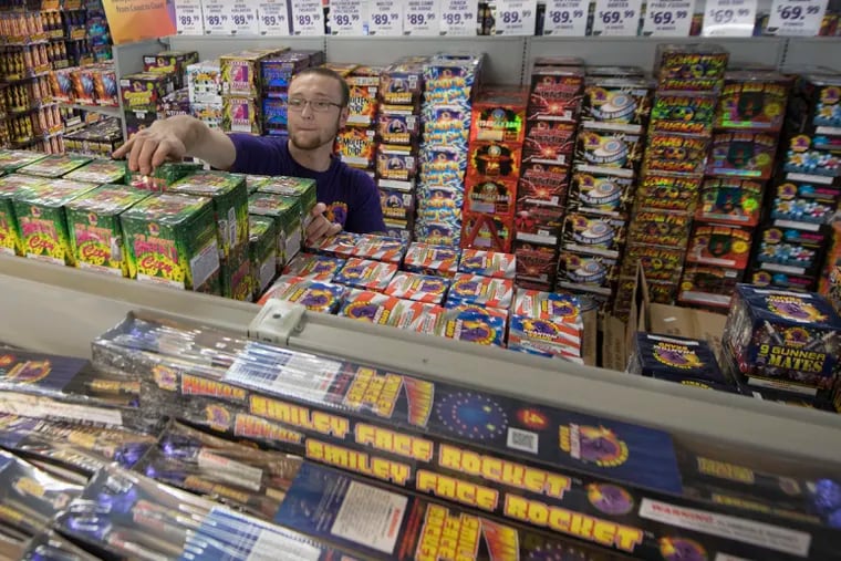 Dylan Stamm, stocks fireworks on the shelves at the Phantom Fireworks in Upland, PA . This is an historic Fourth of July for Pennsylvania: The first where residents can freely purchase and detonate explosive fireworks.