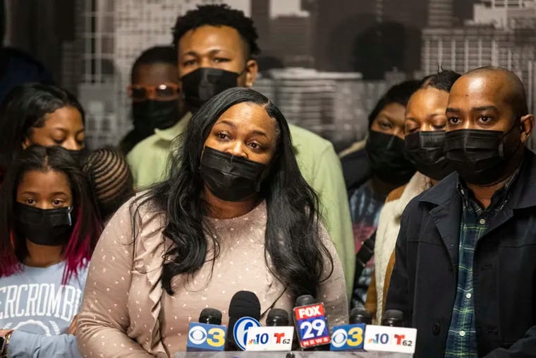 Edwenna Ferguson, police officer whose son was killed in a shooting Monday, speaks to press with the support of family and friends at the FOP Lodge in Philadelphia, Pa., on Tuesday, Jan. 25, 2022. Feguson’s son, Hyram Hill, 23, was shot nine times and died at the 1400 block of West Allegheny Avenue around 4:40 a.m.
