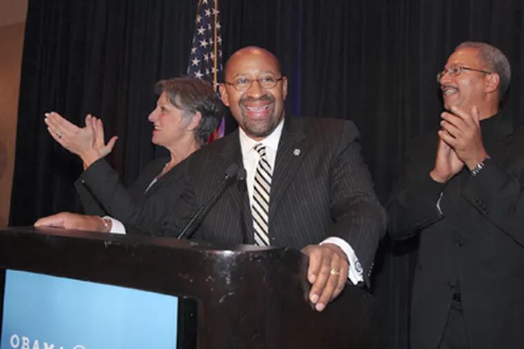 Mayor Nutter, with Reps. Allyson Schwartz and Chaka Fattah (right), speaks to Obama supporters at the Raddison Plaza-Warwick Hotel on Election Night. (Steven M. Falk / Staff Photographer)