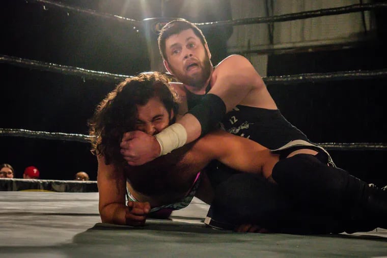 Wrestler Jimmy Rave rakes the face of an opponent in an undated CZW match. Rave recently lost an arm to an infection and the wrestling community is rallying around him.