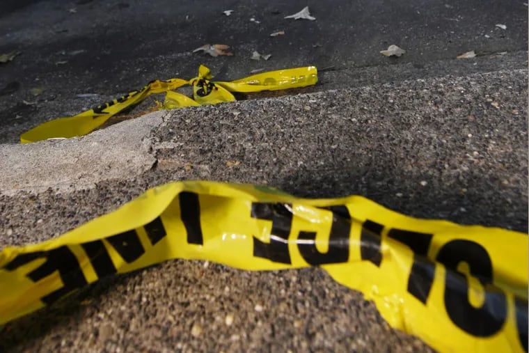 Pieces of police crime scene tape in Philadelphia.