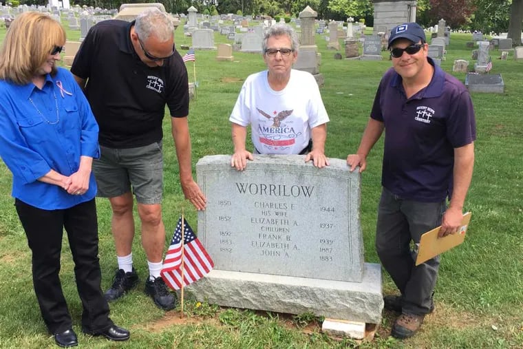 Charles Worrilow was not a veteran, but a favorite of Kimberly Flint (left) anyway. At age 11 he tried to join the Union Army as a drummer, but was rejected. Flint placed a flag at his tombstone. Others pictured (l-r): Mount Hope Cemetery Superintendent Larry Bakey, Flag Man Tony Clark and Mount Hope Cemetery Assistant Superintendent Steffan Tardif.