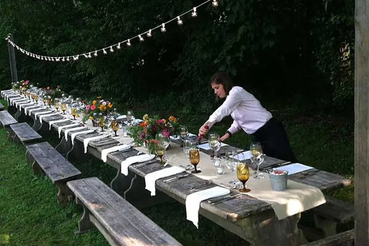 The table is set beside the garden for Blackberry Farm's &quot;Centennial Garden&quot; feast in Walland, Tenn., featuring many heirloom crops with Philadelphia heritage. CRAIG LaBAN / Staff
