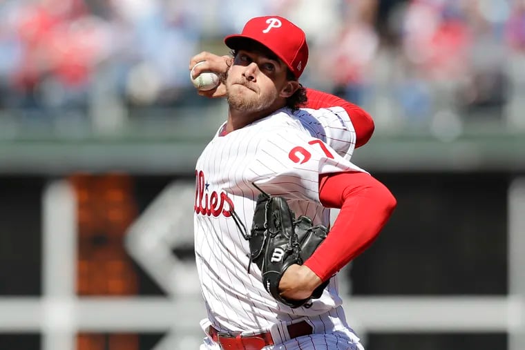 Phillies starting pitcher Aaron Nola throws a first-inning pitch against the Atlanta Braves on Thursday, March 28, 2019 in Philadelphia.