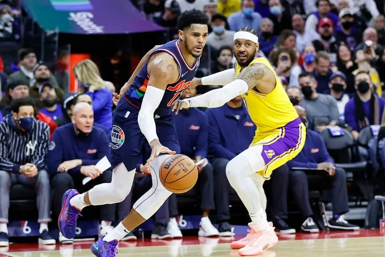 Lakers forward Carmelo Anthony moves to guard Sixers forward Tobias Harris during the first half of Thursday's game at the Wells Fargo Center.