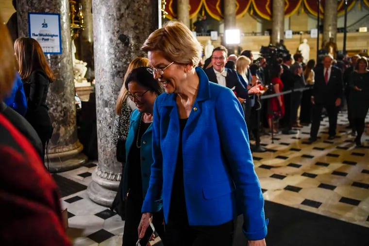 Sen. Elizabeth Warren, D-Mass, walks in to the House chamber ahead of the State of the Union address b at the Capitol on Tuesday.