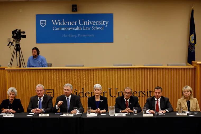 From right: State Superior Court Judge Christine Donohue; state Superior Court Judge David Wecht, Philadelphia Judge Paul Panepinto; state Superior Court Judge Judith Olson; Adams County Judge Michael George; Philadelphia Judge Kevin Dougherty; and state Commonwealth Court Judge Anne Covey participate in a Pennsylvania Supreme Court debate Wednesday, Oct. 14, 2015, at the Widener University Commonwealth Law School in Harrisburg. (AP Photo/Matt Slocum)