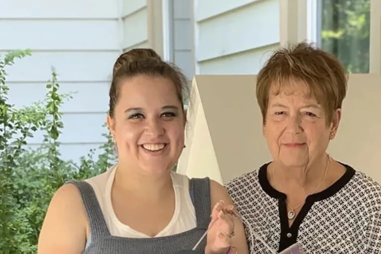 Jessica Kalnas (left) and her mother, Judy Kalnas, in their backyard. "My biggest fear was: 'How am I going to live with this? How am I going to watch this happen?'" Judy says. "The main thing is that we weren't going to lose her."