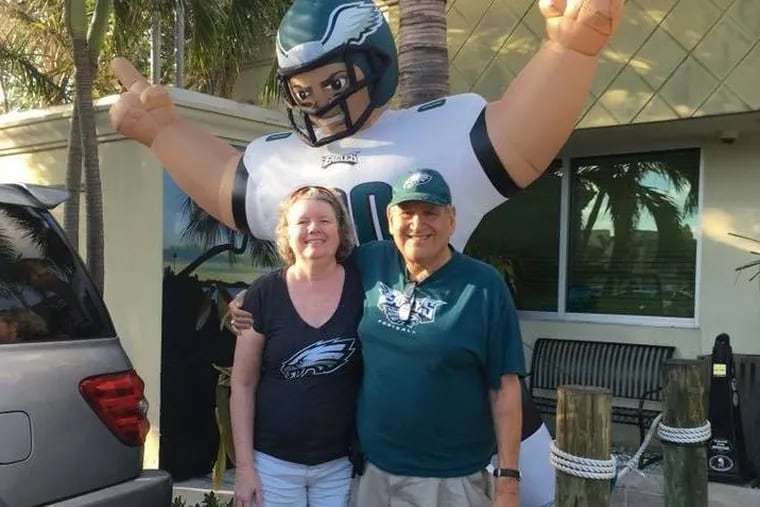 The Hoagie Historian in repose. Howard Robboy and his wife Brenda Zimmerman celebrate an Eagles game outside the Hurricane Bar in Delray Beach, Florida. Perhaps, the biggest booster of the Philadelphia History Museum, Robboy mourned the announcement of its recent closing.