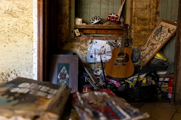Personal items that were damaged and salvaged from the Ida flooding in the home of Gerrie Cirigliano, of Port Providence, Pa., on Oct. 14, 2021.