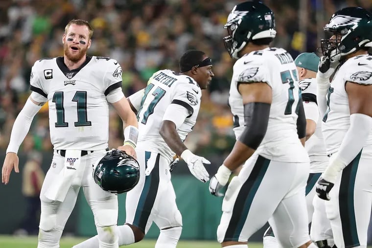 Eagles quarterback Carson Wentz (left) and wide receiver Alshon Jeffery are coming off a huge win at Green Bay. They are laying two touchdowns this week to the winless Jets.