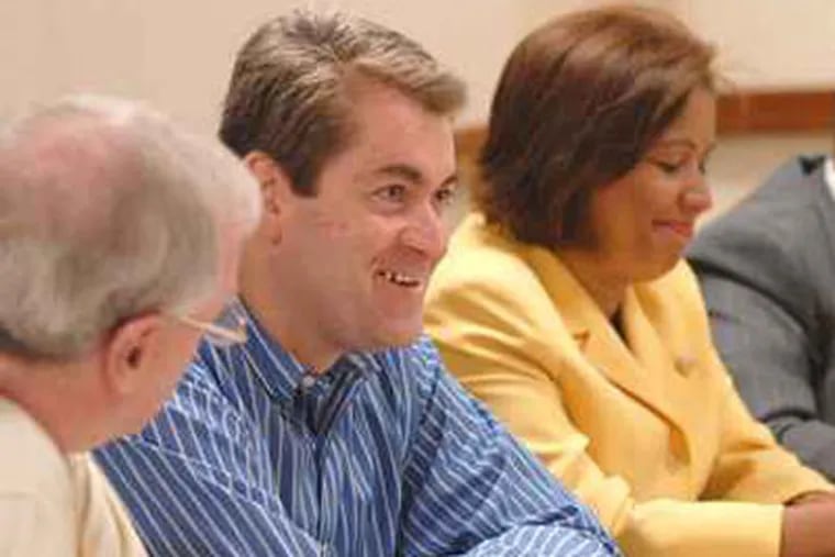 Council members Bill Green, left-center, and Maria Quinones-Sanchez, right. File photo. (April Saul / Staff Photographer)