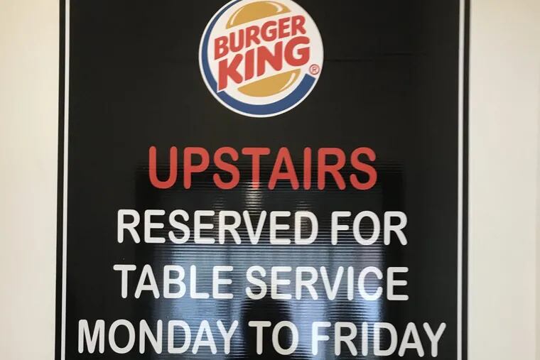 The Burger King on 8th and Market has table service on the second floor.