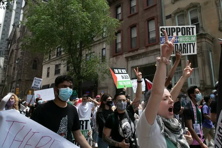 Hundreds march from Rittenhouse Square to City Hall in support of Palestine in Philadelphia on Saturday, May 22, 2021. Protesters in Philadelphia called for an end to the Israeli occupation of Palestine. Earlier in May, teacher Jesse Schwartz was fired from Jack M. Barrack Hebrew Academy after he decried Zionism on Twitter.