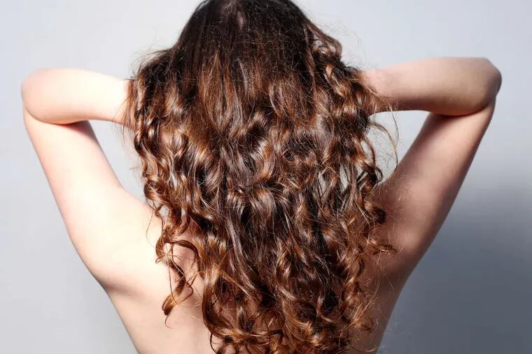 Specialty salons are helping women with curly hair embrace their locks rather than just straighten or cut them short.