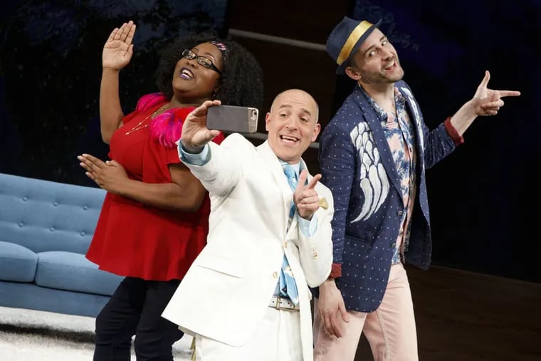(Left to right:) Ashley D. Kelley, Harry Bouvy, and Joe Kinosian in “An Act of God,” through June 16 at Bucks County Playhouse.