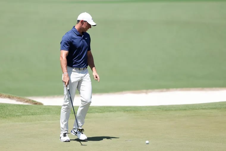 Rory McIlroy of Northern Ireland reacts after missing a putt on the second green during the final round of the 2024 Masters Tournament at Augusta National Golf Club on April 14, 2024 in Augusta, Georgia.